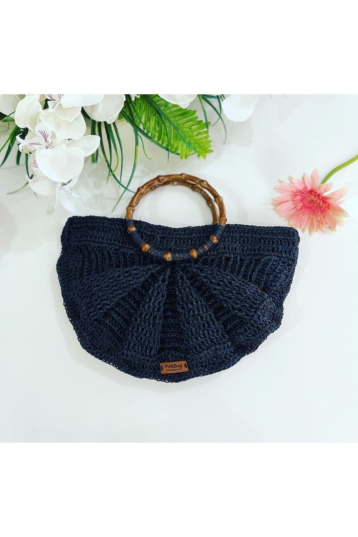 Sac à main artisanal en paille en forme de coquillage