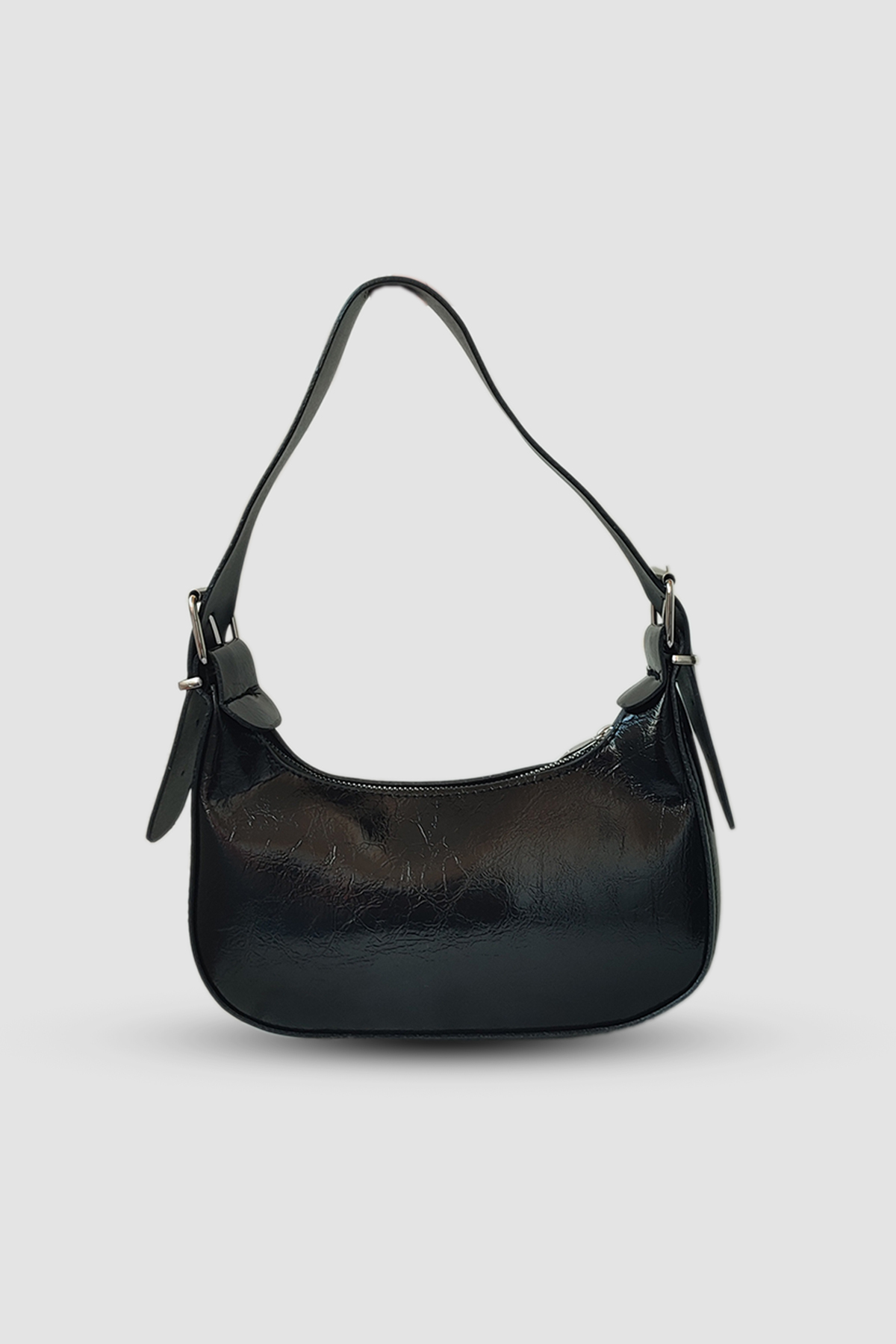 Sac à bandoulière en cuir verni noir